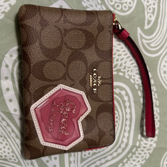 Authentic COACH Signature coated canvas/leather heart( good times) zip wristlet - Picture 1 of 4